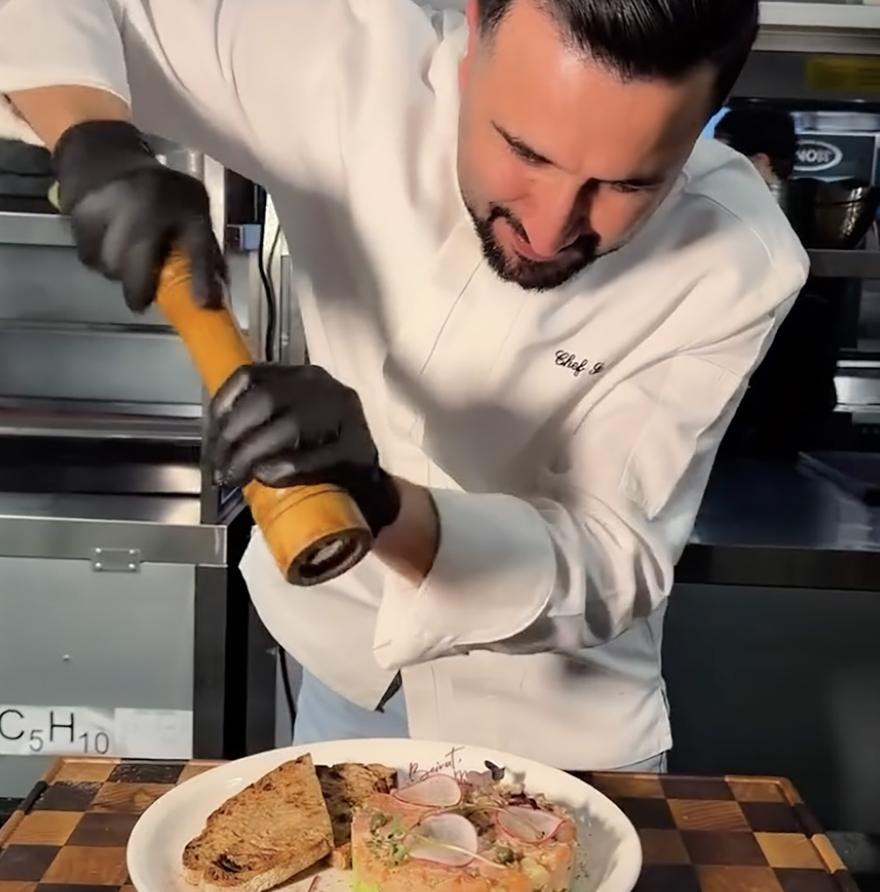 Chef finishing a dish